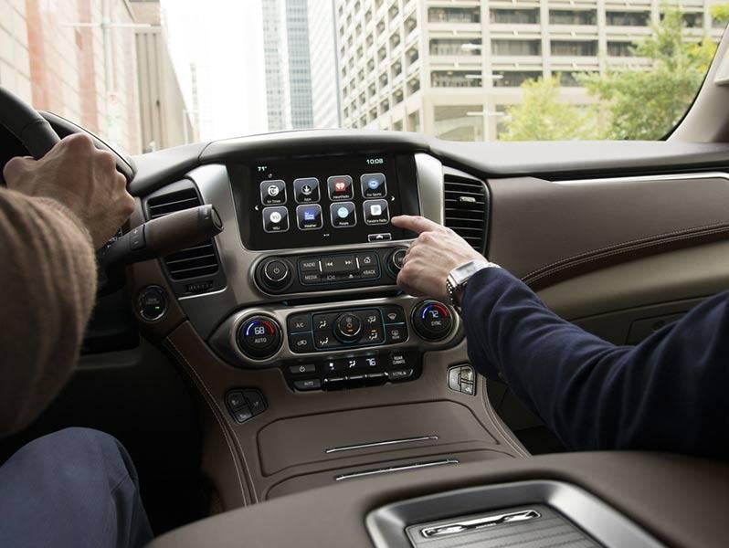 Passenger using apps on car touchscreen